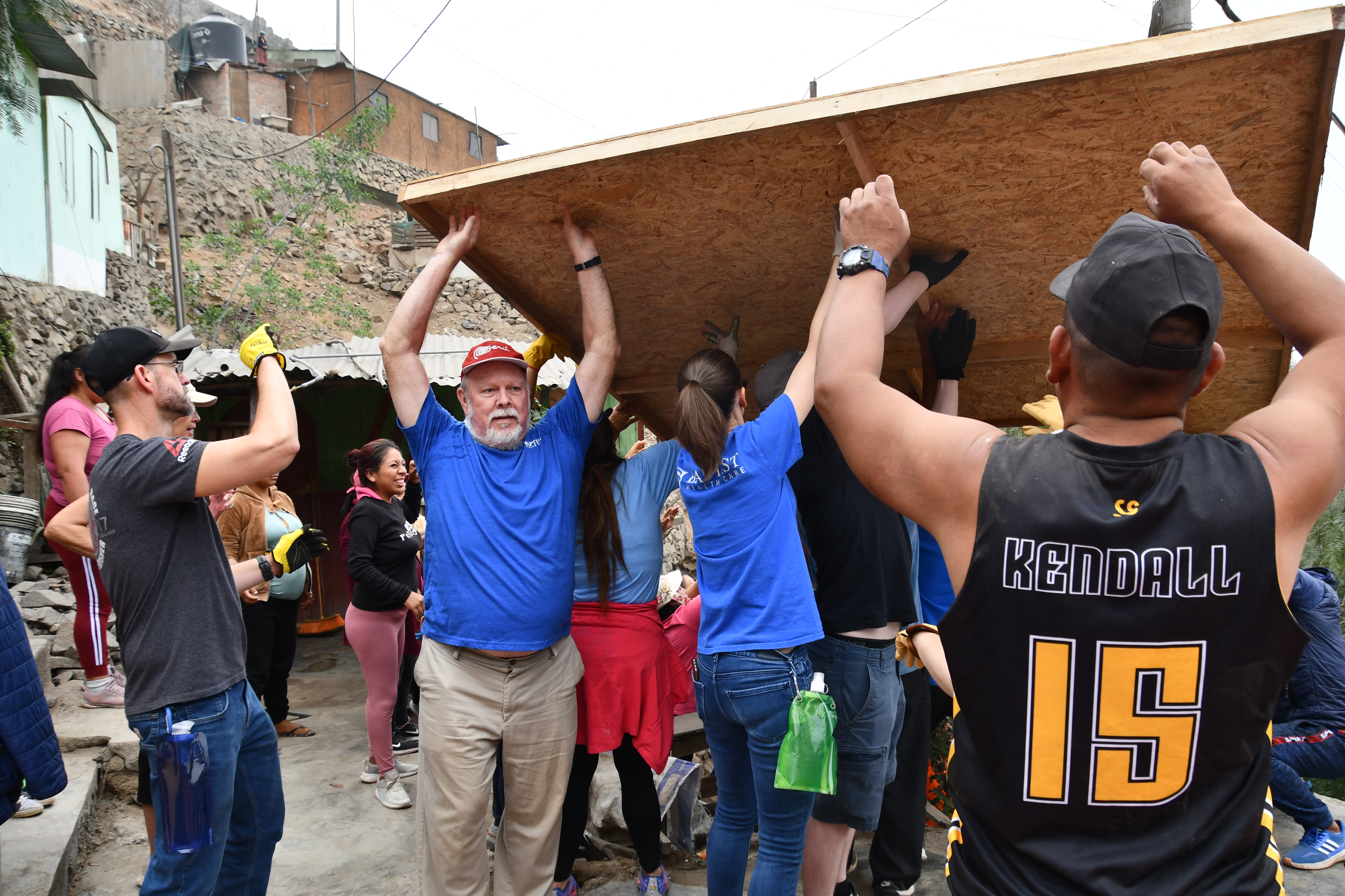 Mission trip members helping to build a house