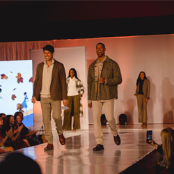 Men posing on the runway